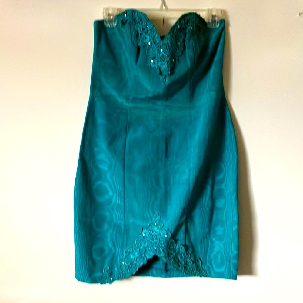 A Woman dresses Brand Zum Zum Professionally Dry Clean Only made in USA.
